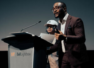 Tonfunmi Adebise and Ralph Pineda on stage at the 2023 TFS Film Fest