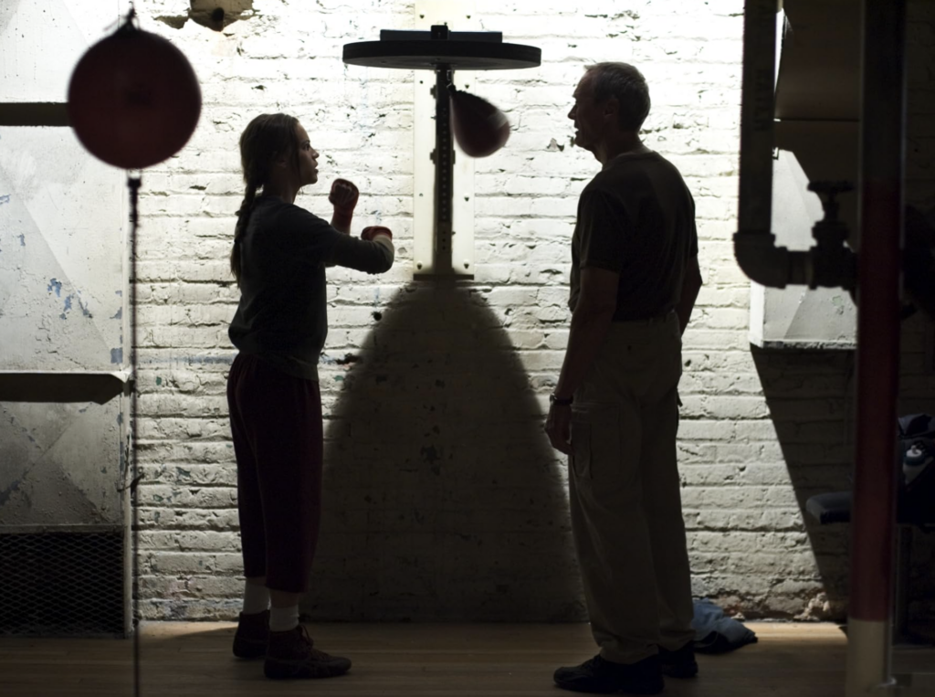 Image of Clint Eastwood and Hilary Swank practicing boxing in Million Dollar Baby