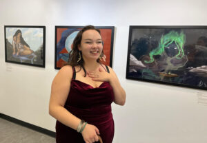 Saelym Degrandpre celebrates her first-ever exhibition at ᕿᓐᓂᕋᔮᑦᑐᖅ Qinnirajaattuq / Ripples: Making Waves in Inuit Art Symposium in Montreal.