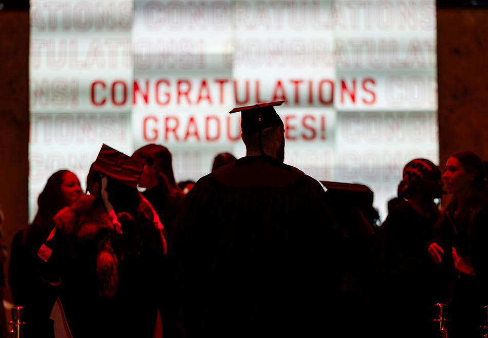 TFS grad in silhouette
