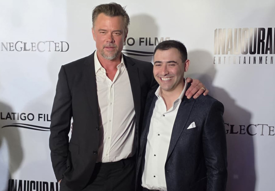 Josh Duhamel & Adam Levine on red carpet at the premiere of Neglected. 
